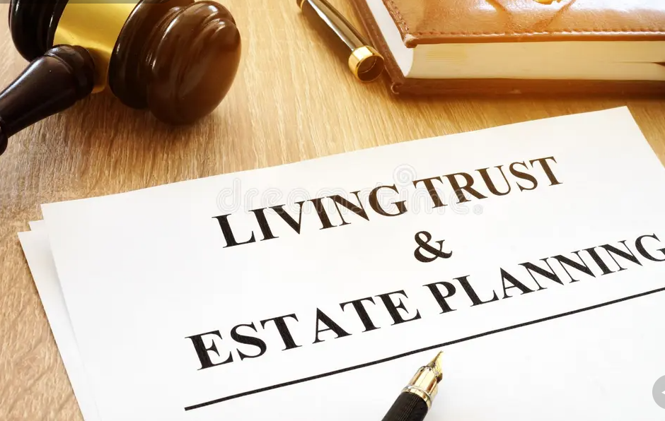 Gavel, a pen, and a living trust document titled 'Living Trust & Estate Planning' on a wooden desk.